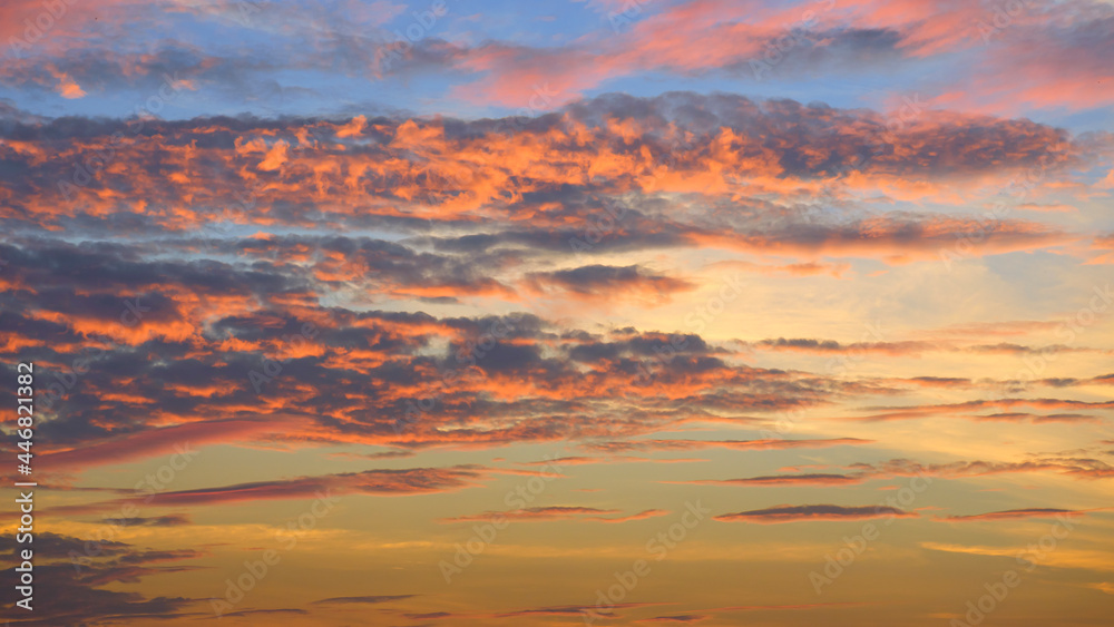 Orange cloudy on dramatic sunset sky background