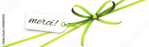 ribbon bow with greetings thanks (french text merci)