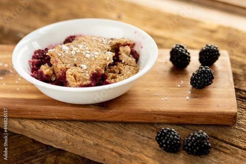 a bowl of blackberry cobbler photo