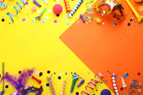 Flat lay composition with carnival items on color background. Space for text