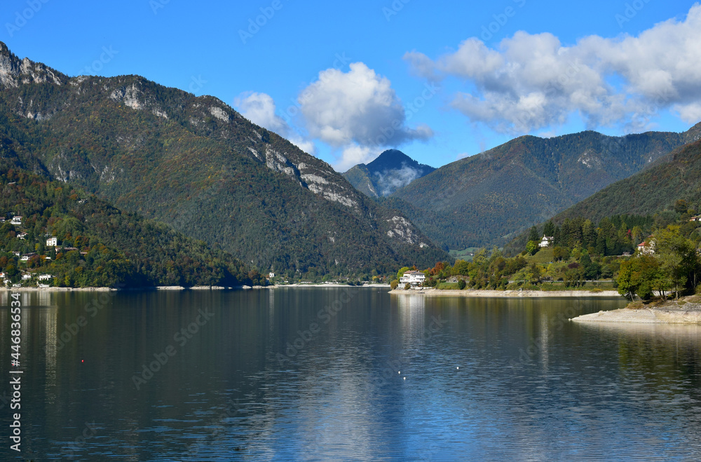 Lago di Ledro and its surrounding mountains. View from Molina on a clear autumn day. Trentino, Italy.