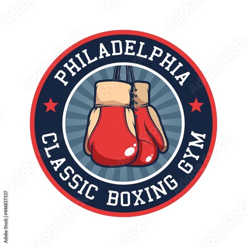 Retro boxing emblem with red boxing gloves. Boxing club logo. Vector illustration.