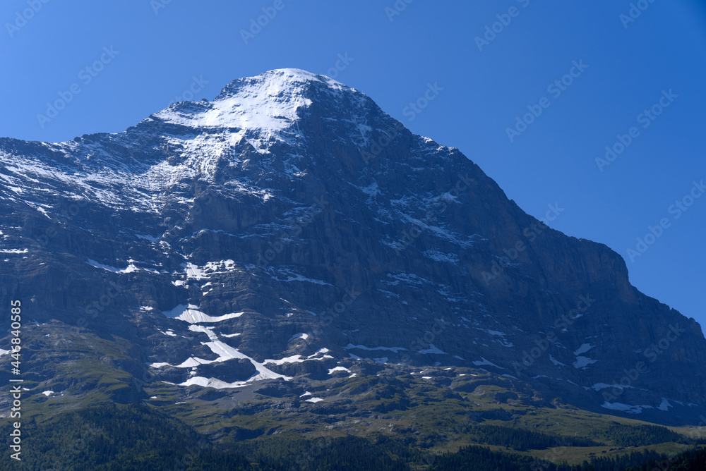 Mount Eiger on a sunny summer day seen from cable car station Grindelwald Terminal. Photo taken July 20th, 2021, Grindelwald, Switzerland.