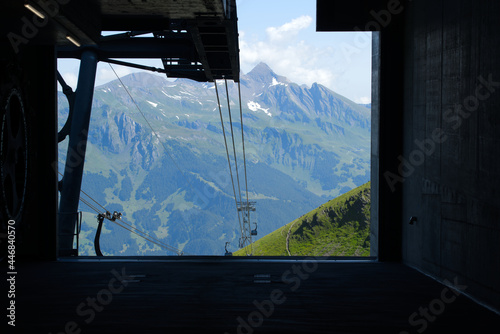 Fototapeta Naklejka Na Ścianę i Meble -  Brand new cable car Eiger Express, introduced December 2020. The 44 cabins are running between station Grindelwald Terminal and station Eiger glacier. Photo taken July 20th, 2021, Switzerland.
