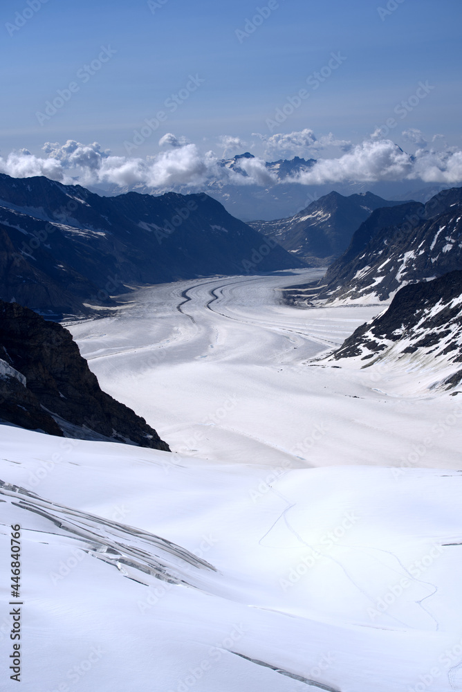 Fototapeta premium Aletsch glacier with Konkordia square seen from Jungfraujoch on a sunny summer day. Photo taken July 20th, 2021, Lauterbrunnen, Switzerland.