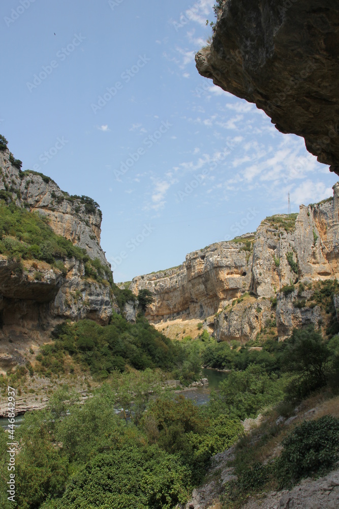 Cliffs of large rocks with vegetation to the Foz de Lumbier to Navarre Cliffs of large rocks with vegetation to the Foz de Lumbier to Navarre