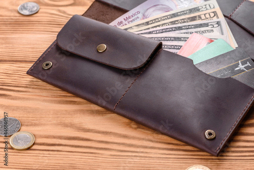 Beautiful leather brown purse made of leather to store paper money