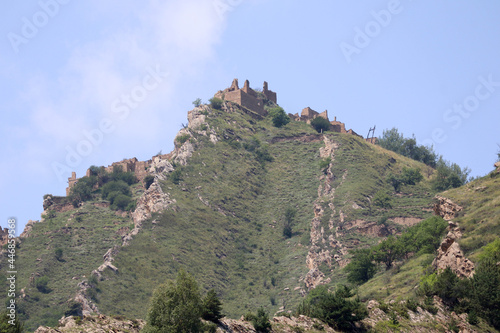 view to abandoned ancient village Gamsutl in the Dagestan from the foot of the mountain photo