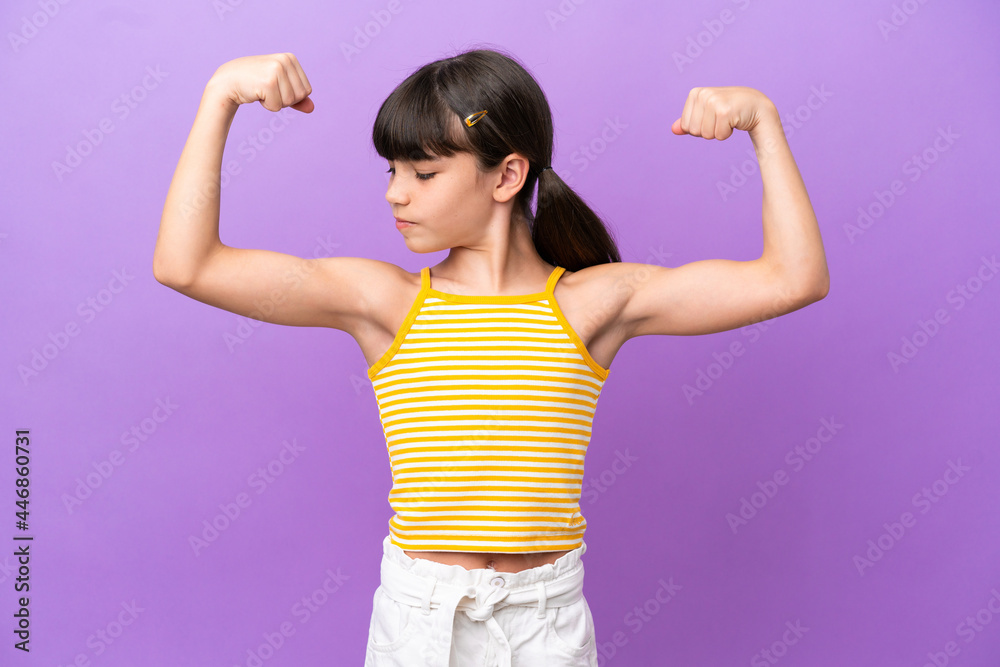 Little caucasian kid isolated on purple background doing strong gesture Little caucasian kid isolated on purple background doing strong gesture