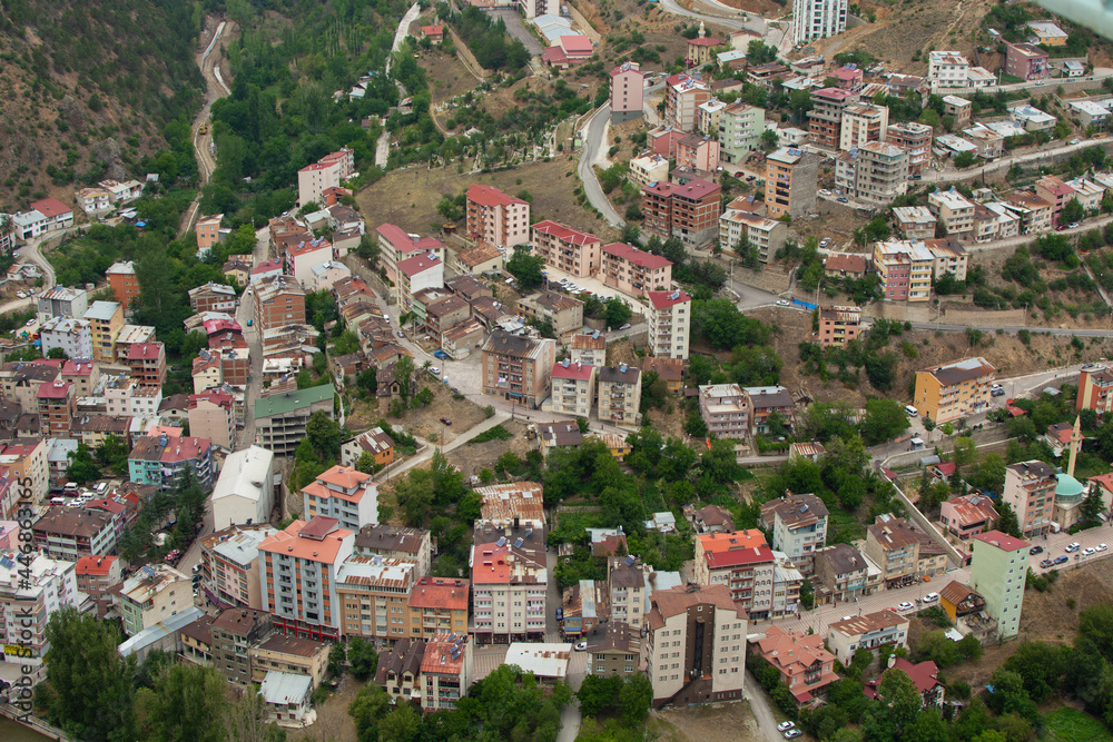 Fototapeta premium Torul, Gumushane, Turkey- June 28 2021: A view of the city center of the Torul district of Gumushane province from above.