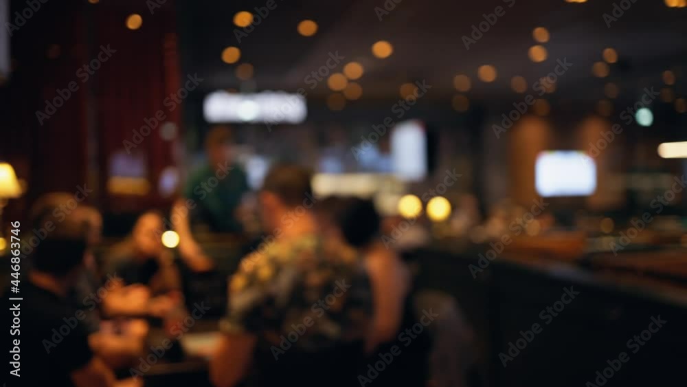 Waiter takes an order in bar that is open after coronavirus pandemic Waiter takes an order in bar that is open after coronavirus pandemic