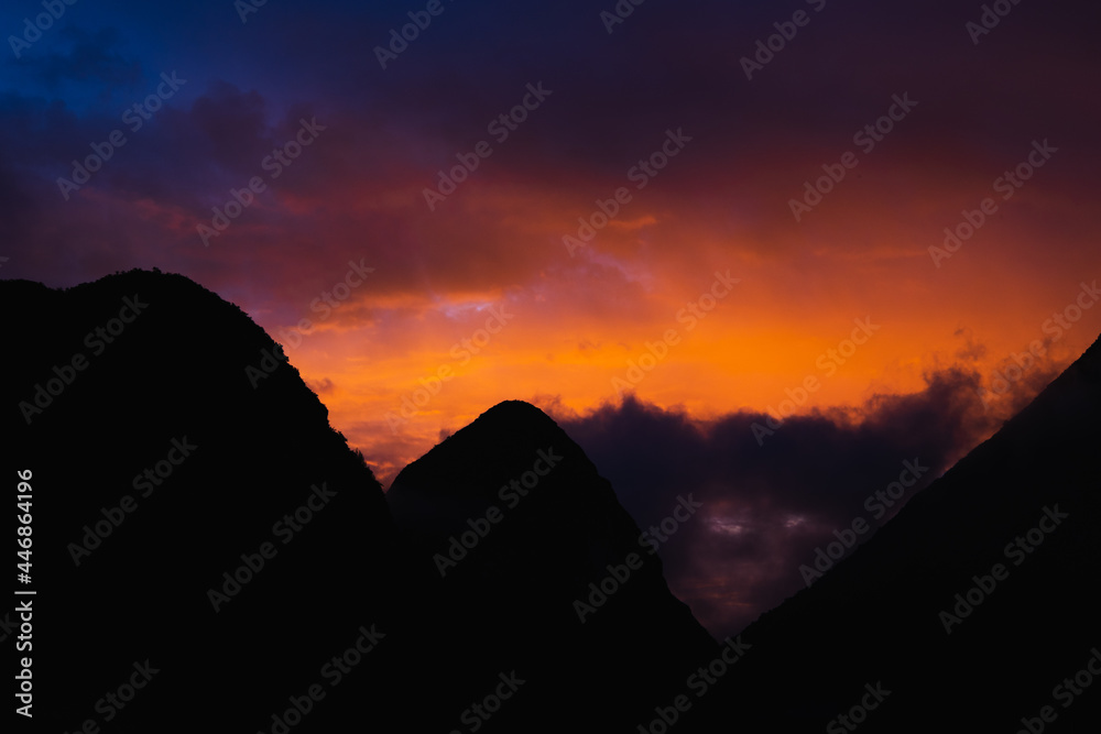 A fiery sunset over volcanos in northern Ecuador