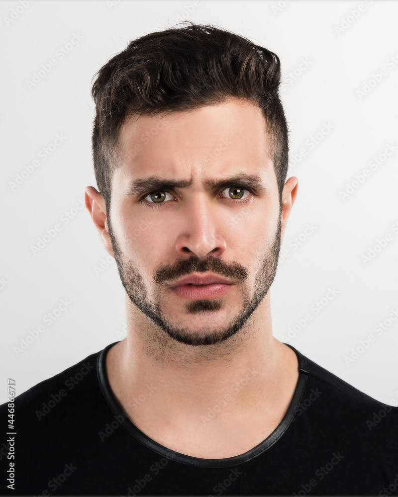 Young man with a angry expression Young man with a angry expression