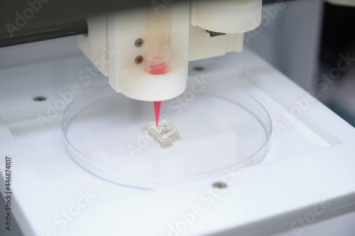 3D bioprinter printing a ear prototype into a petri plate. photo