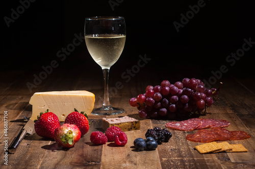 Charcuterie with cheese, meats and fruits