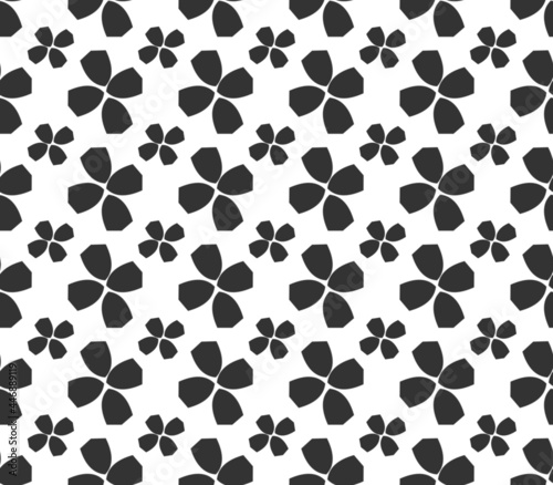 Pattern with black shapes on a white background.
