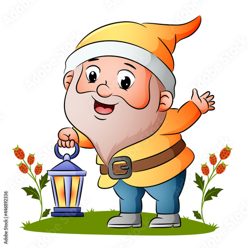 The happy dwarf is holding the lantern with the lamp