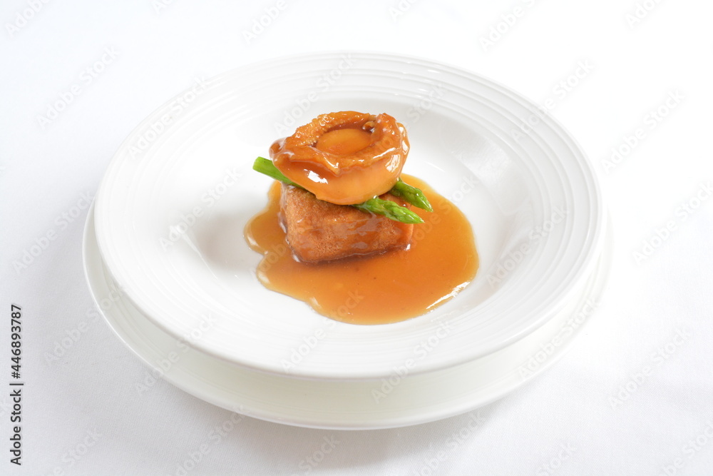 braised whole big abalone with bean curd tofu and broccoli in chef