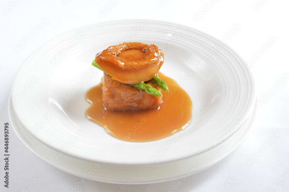 braised whole big abalone with bean curd tofu and broccoli in chef