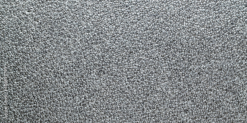 Black grain background. Gray wall for board background. Grey styrofoam foam texture or white plastic polystyrene pattern.