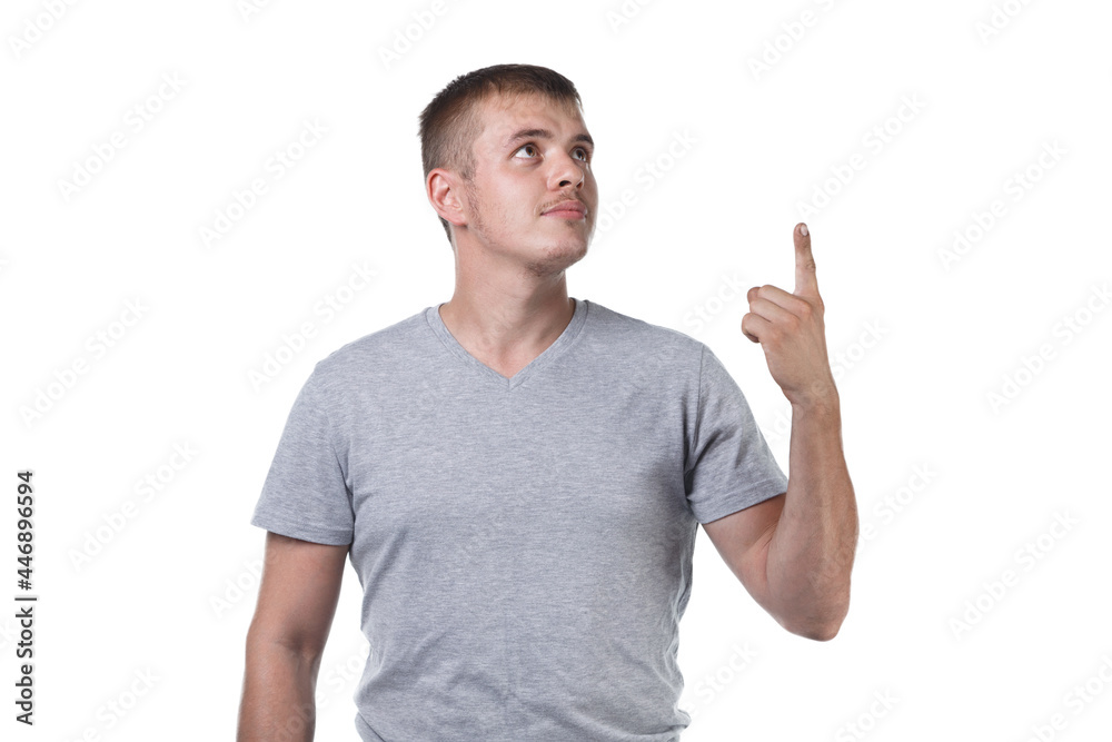 Photo of young man with bristle showing forefinger up Photo of young man with bristle showing forefinger up