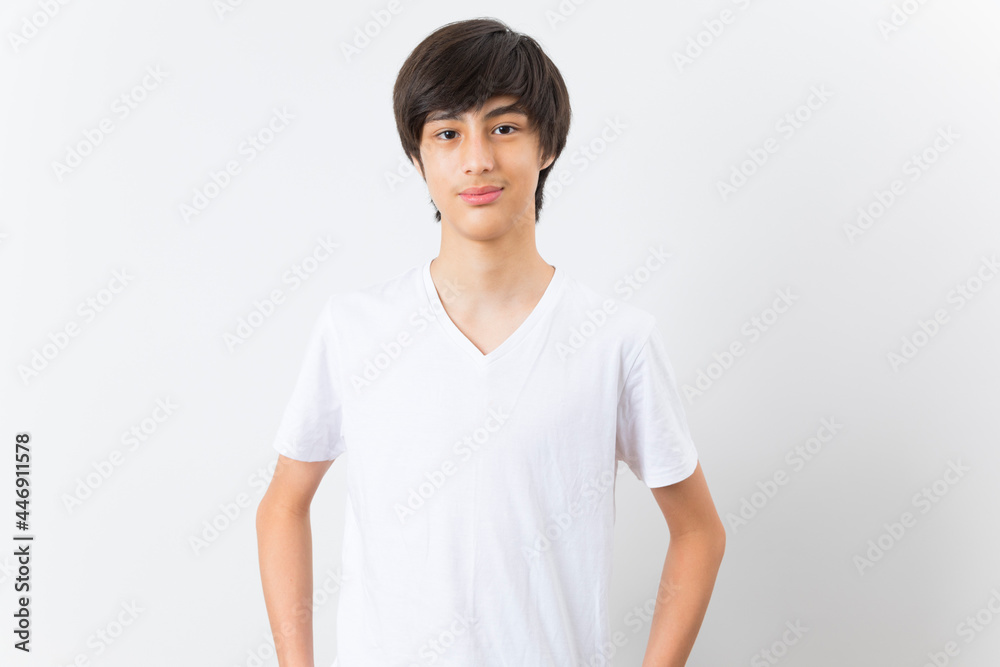 Handsome teen boy smile and standing on white background. Handsome teen boy smile and standing on white background.