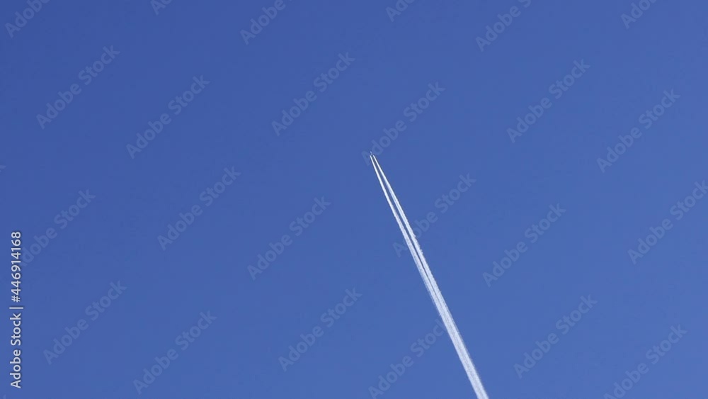 airplane contrail against blue sky
airplane contrail against blue sky