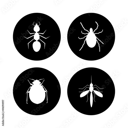Harmful insects set icon isolated on white background. Tick, ant, flea and mosquito inside black circle sign. White silhouette pests in black round. Pest control label. Stock vector illustration