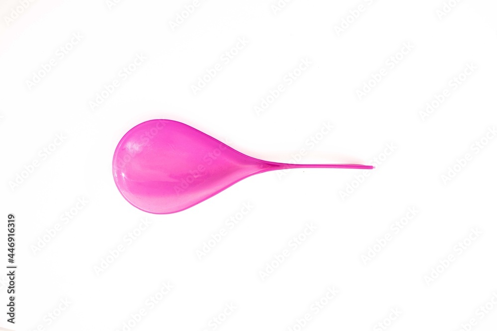 plastic rice paddle spoon isolated on a white background plastic rice paddle spoon isolated on a white background
