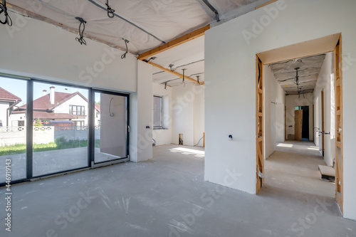 Empty unfurnished room with minimal preparatory repairs. interior with white walls
