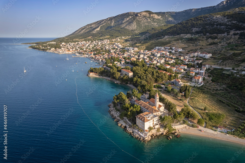 Town Bol on island Brac with the monastery in the foreground, Croatia