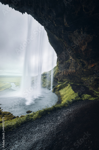 Atmospheric, moody view of Seljalandsfoss waterfall. Southern Iceland.