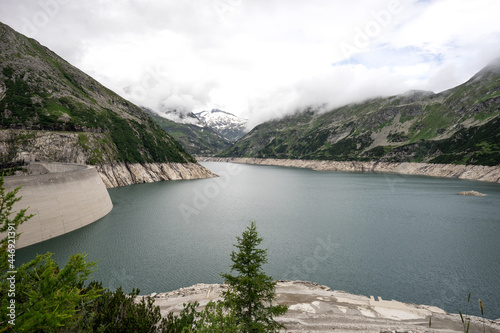 Maltastaudamm and Kolbreinspeicher in Malta valley. Carinthia. Austria. Dam and Reservoir of a Hydroelectric Powerplant in Stunning Alpine Landscape photo