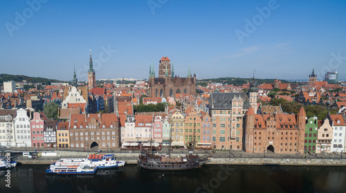 Beautiful scenery of the old town in Gdansk over Motlawa river at dawn, Poland.