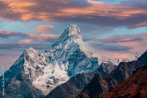 Ama Dablam means "Mother's necklace"  the long ridges on each side are like the arms of a mother (ama) protecting her child. © Gorakh Bista