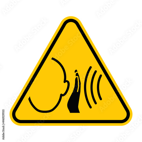 Sudden loud noise warning sign. Vector illustration of yellow triangle sign with human head and hand and three curved lines symbolizing sound waves. Ear protection symbol. Caution annoying sounds.