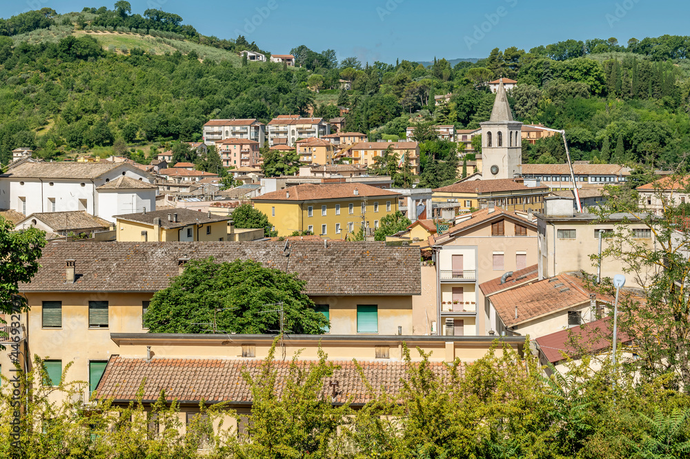 A glimpse of the historic center of Spoleto, Italy, on a sunny day