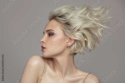Stampa su tela Portrait of a beautiful blonde girl with a short haircut