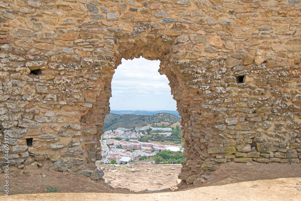 Opening in the castle wall of Constantina, Seville, Andalusia, Spain