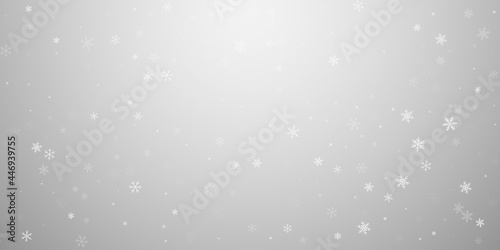 Sparse snowfall Christmas background. Subtle flyin