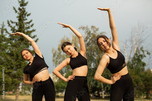 yoga beautiful young women in sportswear in the park 