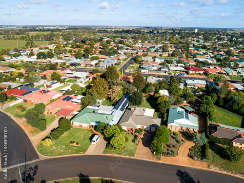 Aerial view of streets and houses in country town of Narromine in NSW on sunlit day photo