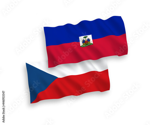 National vector fabric wave flags of Czech Republic and Republic of Haiti isolated on white background. 1 to 2 proportion.