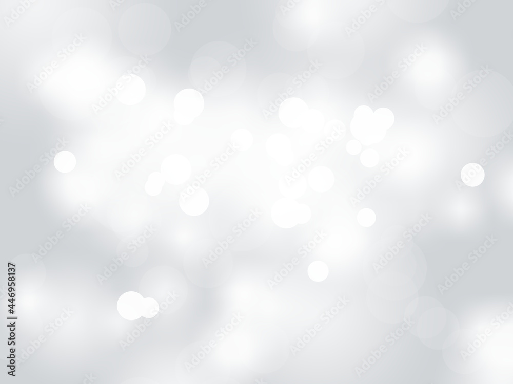 Winter light and white abstract bokeh on a bluish background Winter light and white abstract bokeh on a bluish background