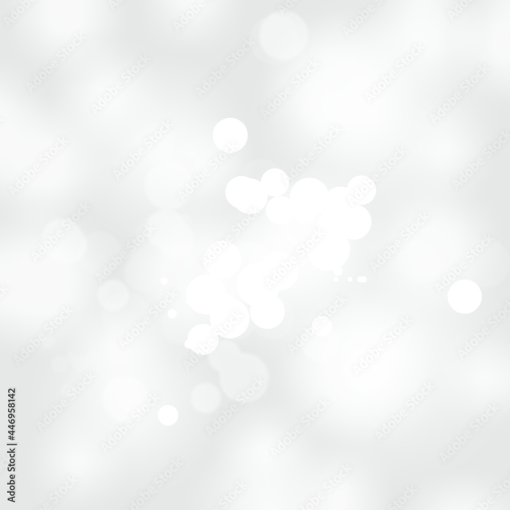 Winter light and white abstract bokeh on a bluish background Winter light and white abstract bokeh on a bluish background