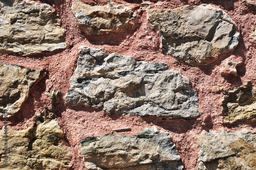 Fototapeta premium An old wall of large stones. Rough masonry.