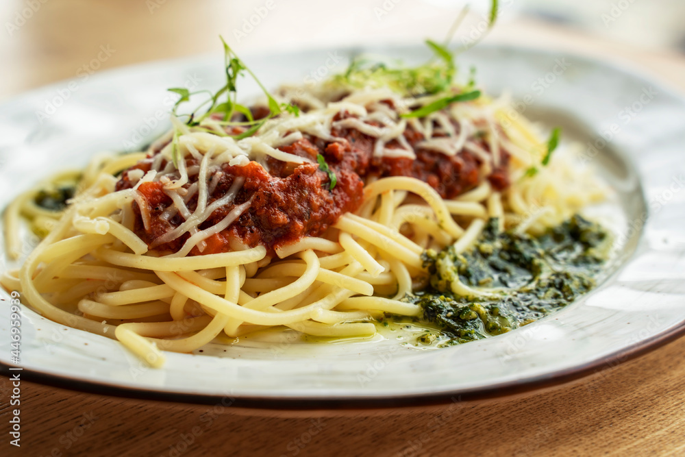 spaghetti with sauce. Pasta with tomato sauce, delicious appetizing classic spaghetti pasta with tomato sauce, parmesan cheese and fresh basil

