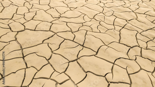 Cracked and dry clay soil due to lack of rain, Rio Po, Italy