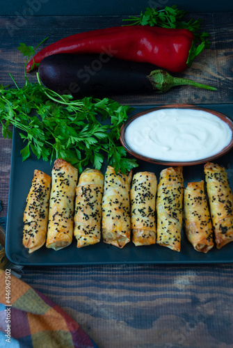 Burek. made from thin pita bread with meat, eggplant and pepper
