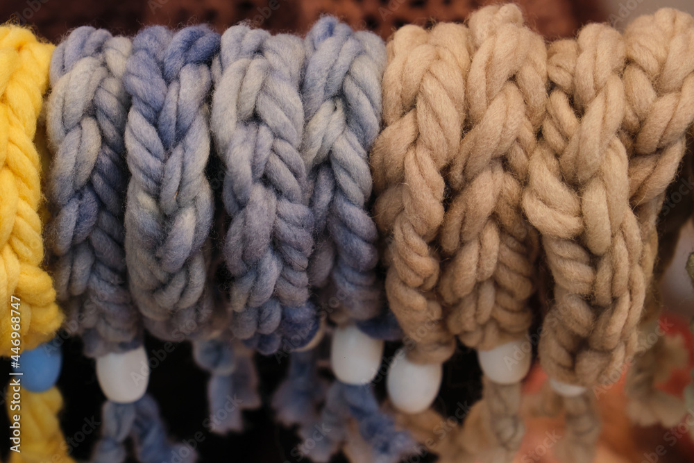 yellow blue brown wool braids